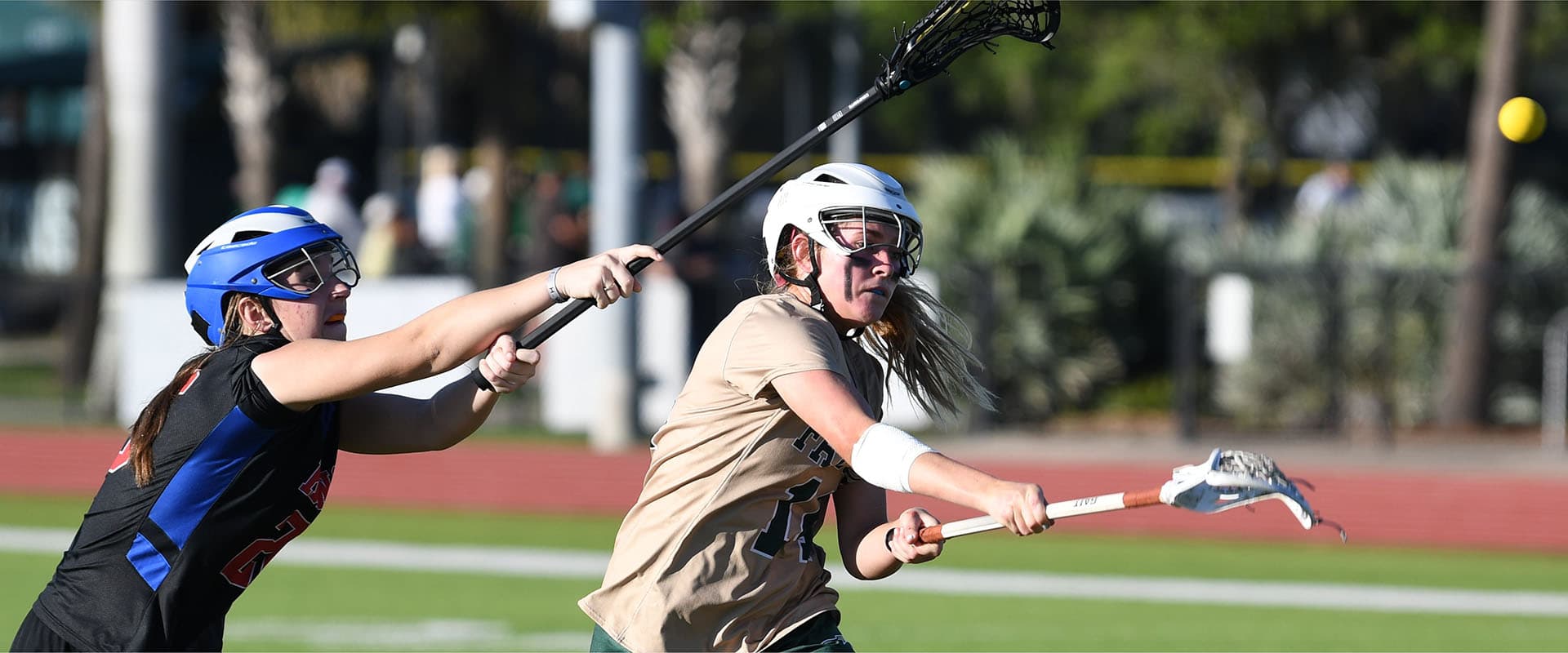 Students playing lacrosse